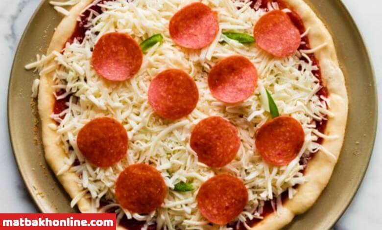 طريقة عمل عجينة البيتزا في البيت سهلة للمبتدئين 4